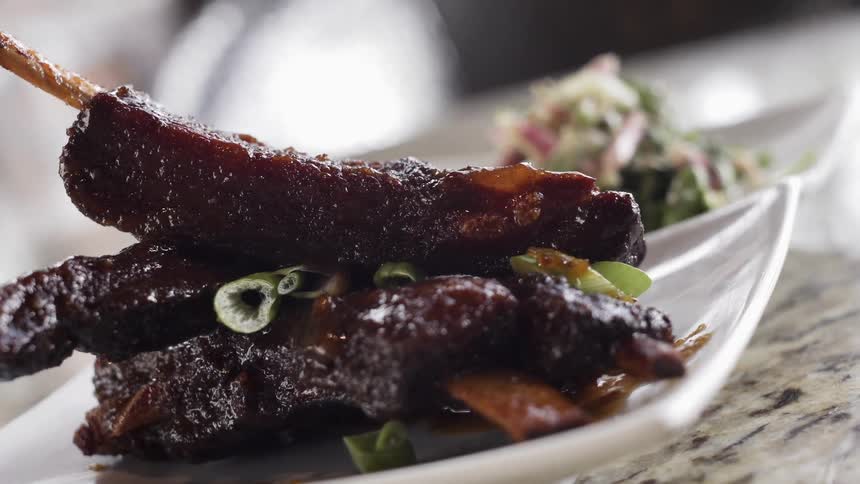Ribs are served on a plate