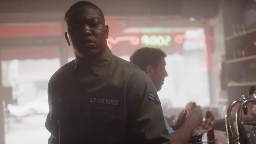 A service member walks out of a restaurant