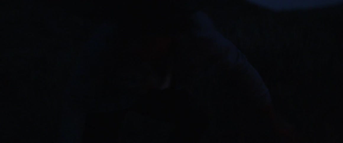 Flame moving in darkness