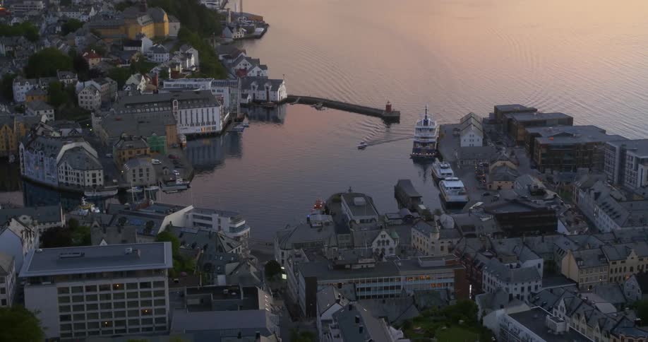 A boat floats into a bay