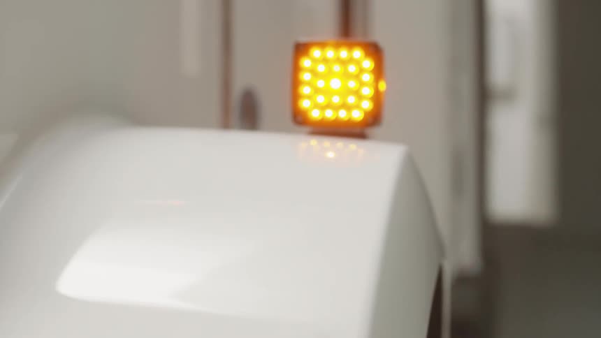 A truck headlight is turned on