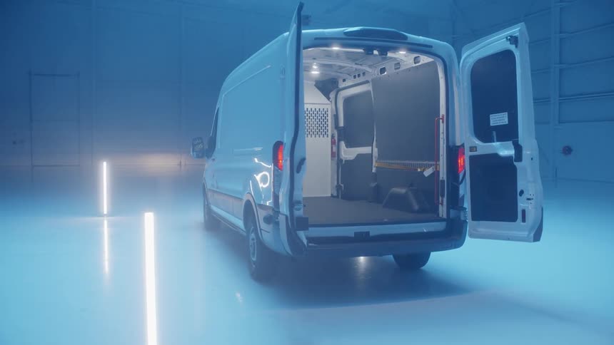 A utility van is illuminate by strip lights