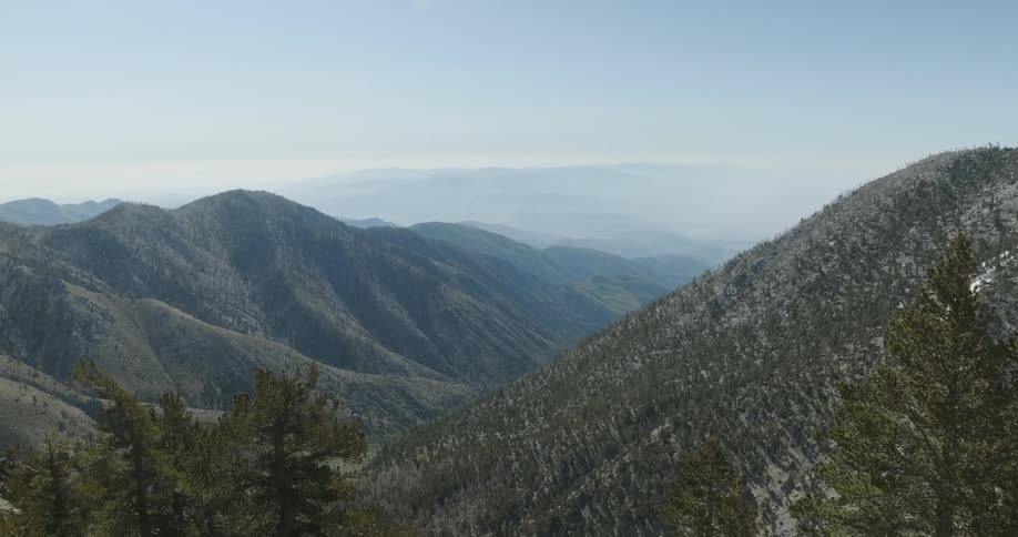 A mountain range is shown on a clear day