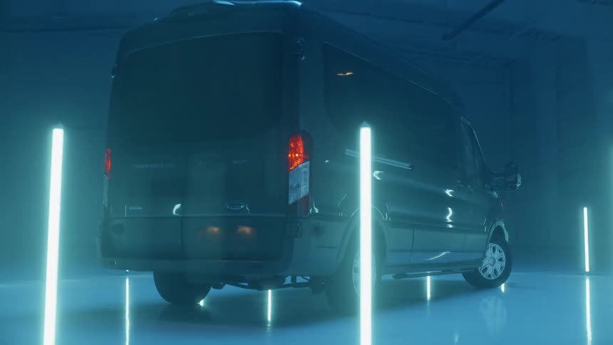 The van is in the dark in the garage
