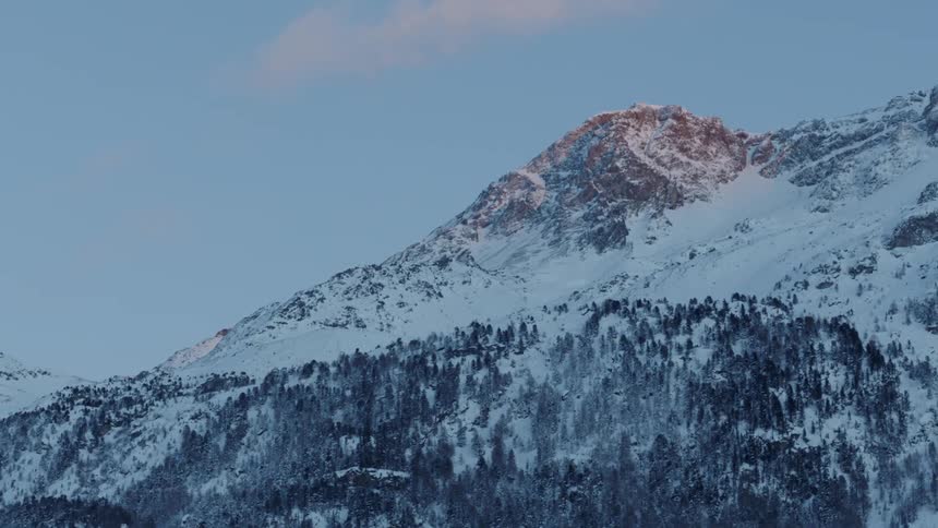 Snow covers the mountain
