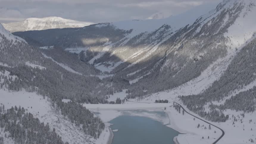 Snow covers the mountain landscape
