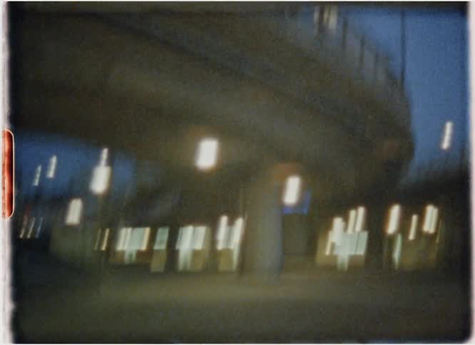 Walking under a bridge by night Super 8