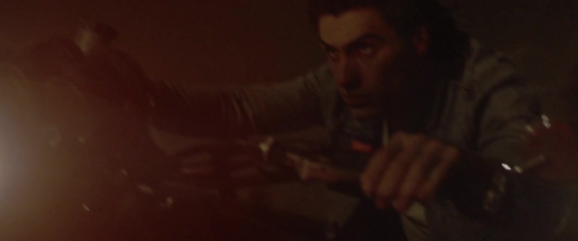 A man drives fast on a motorcycle