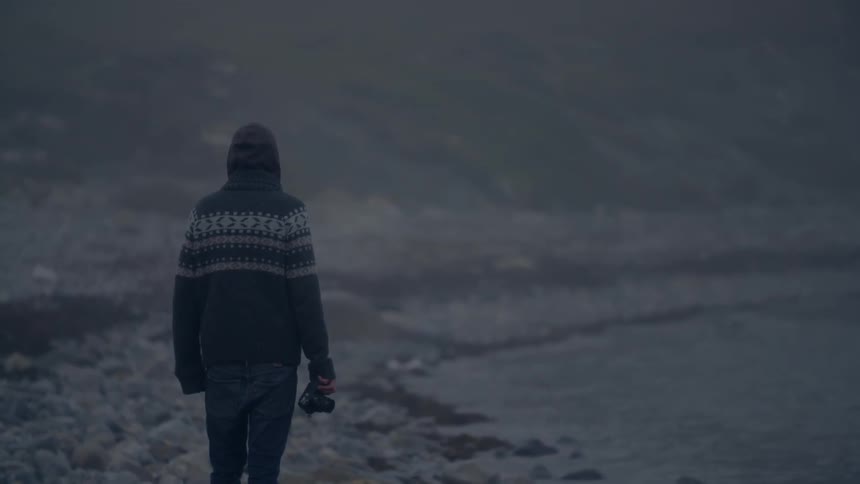 A person staring off at the horizon