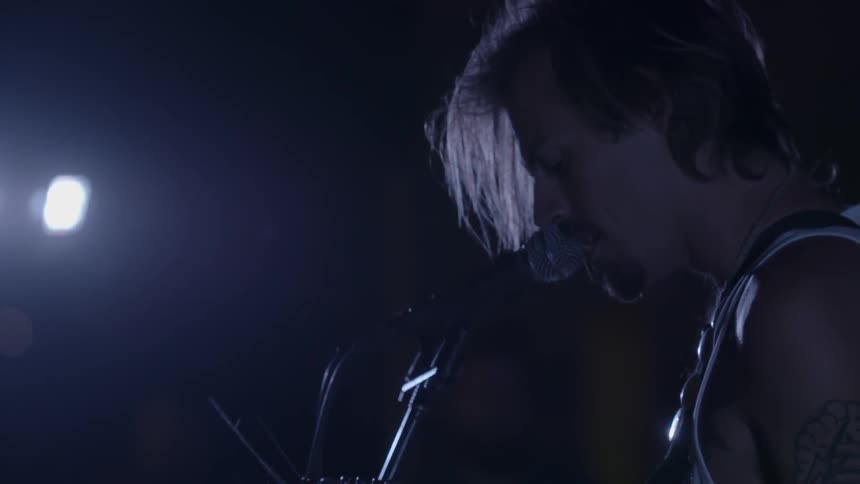 A person playing a guitar