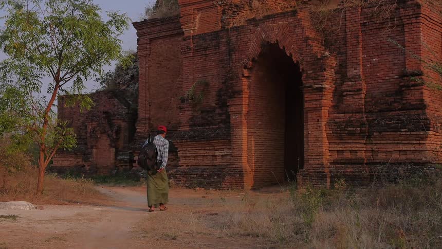 A person entering a building
