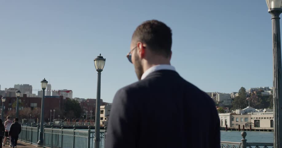 Man walking through the city in the afternoon