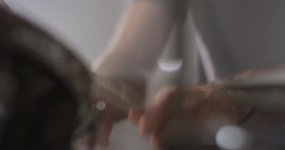 Person drums on a drum set