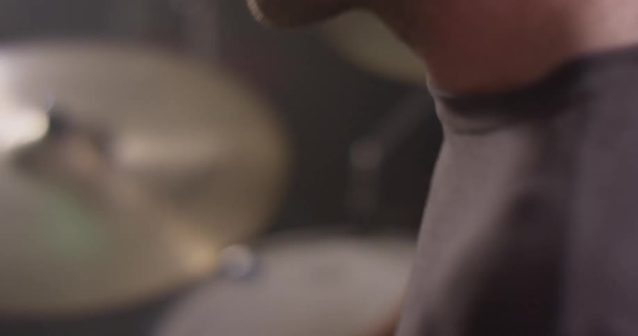 A man plays the drums