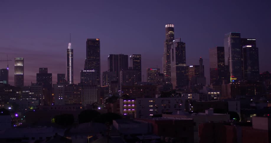 Night is settling over a city skyline