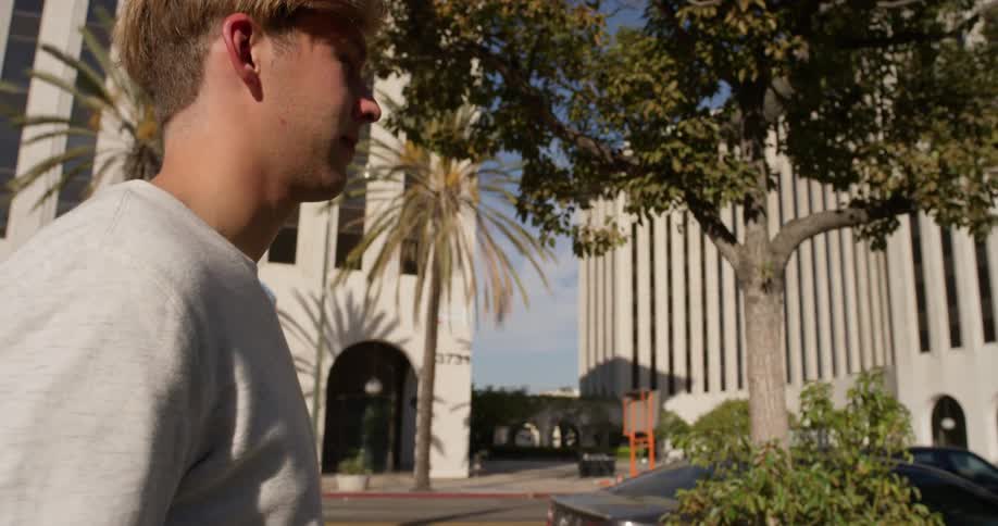 Man walking down urban street