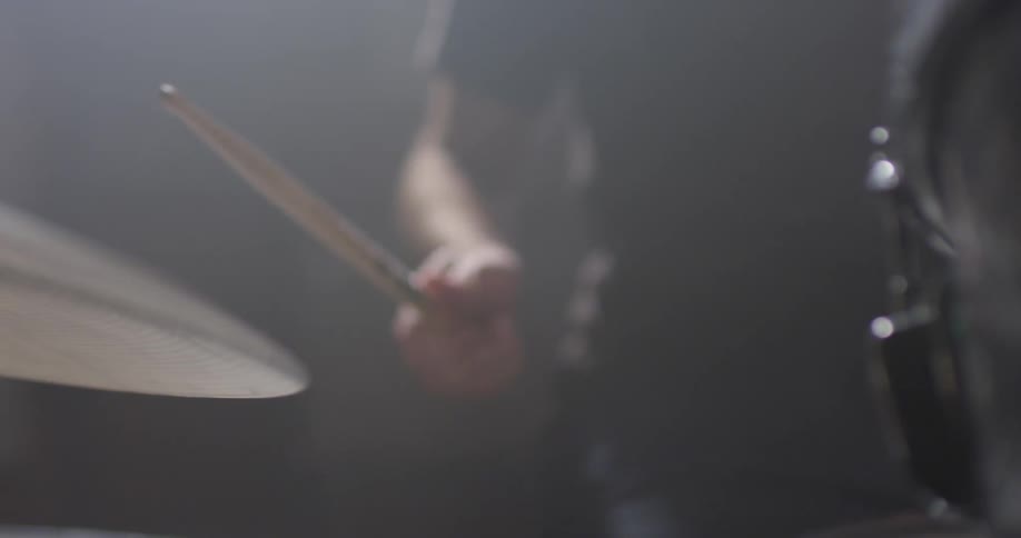 A man plays the drums