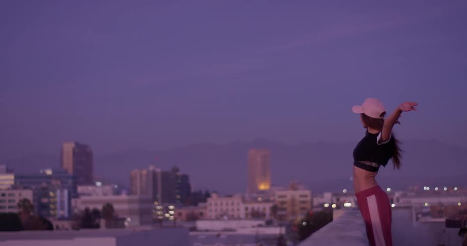 Hip Hop Dancer On Rooftop