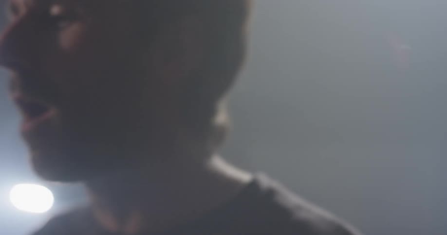 A man plays on the drum kit