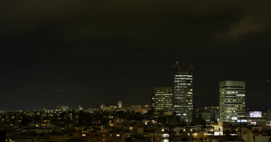 The city is brightly lit at night
