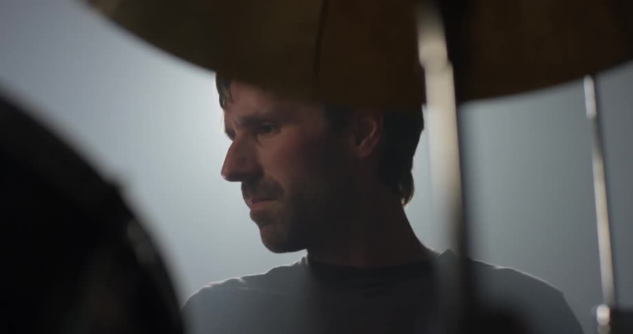 A man plays on the drums
