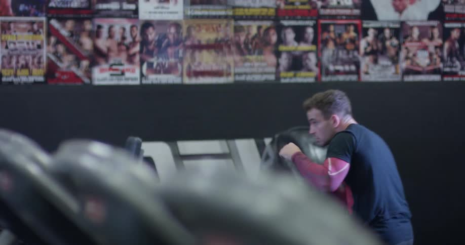 A man trains by throwing punches