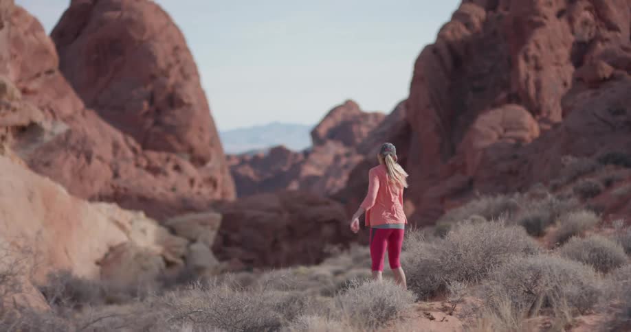 Woman Exercising In The Desert