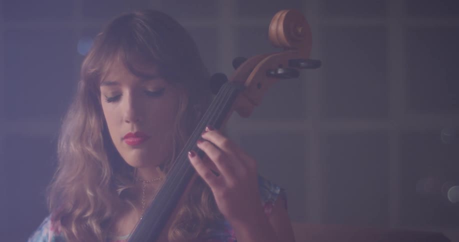 A woman plays the cello
