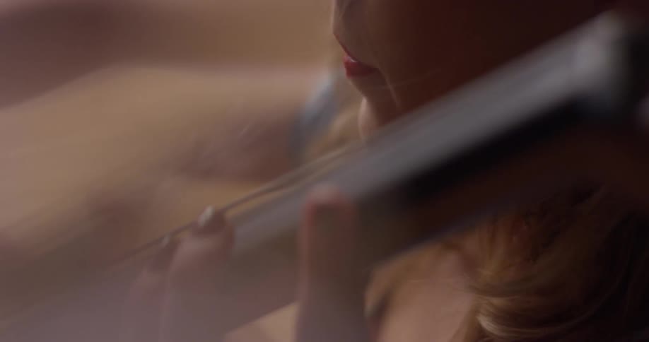 A woman plays the cello