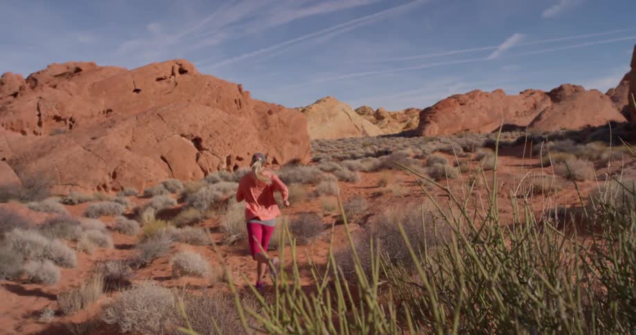 A woman jogs outside