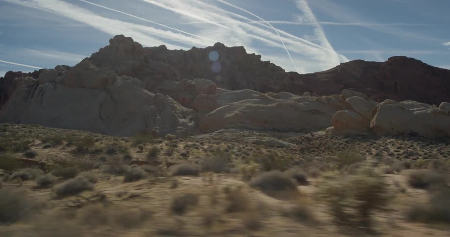 The desert leads to mountains ahead