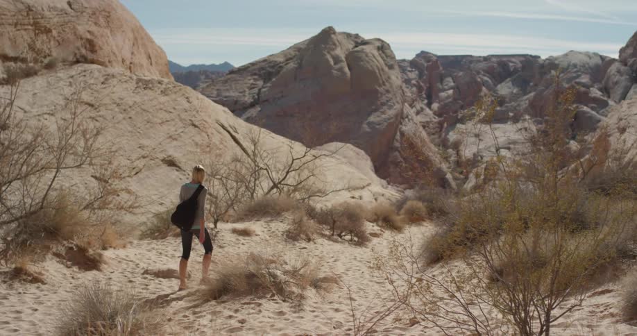 Woman Exercising In The Desert