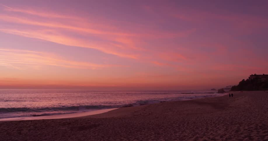 Woman Watching Sunset At Beach