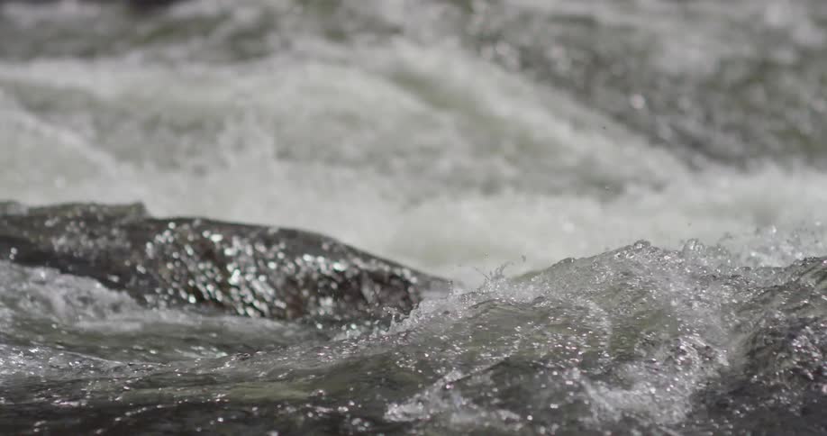 A river flows over rocks