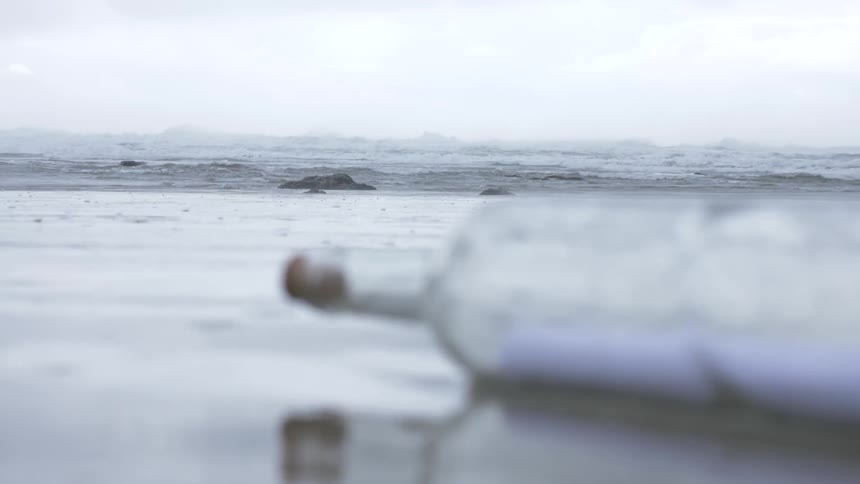 A Message In A Bottle On The Beach
