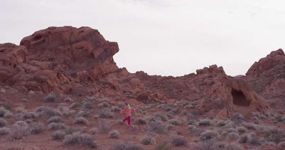 Woman Exercising In The Desert