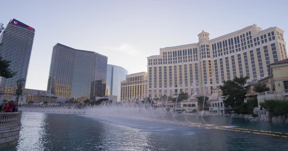 Water shoots up from the fountains in the lake in the city