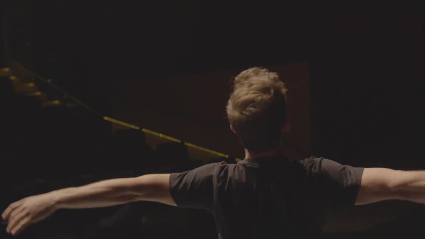 A man practices dancing