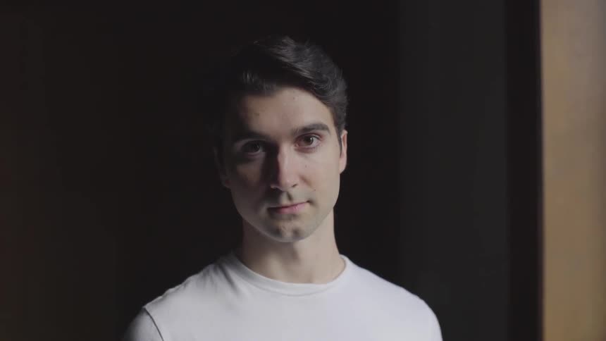A man looks up staring forward