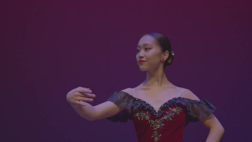 A woman is performing on the stage