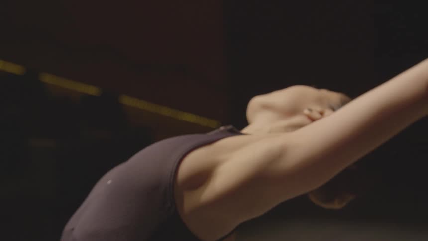 Woman dances in an empty room