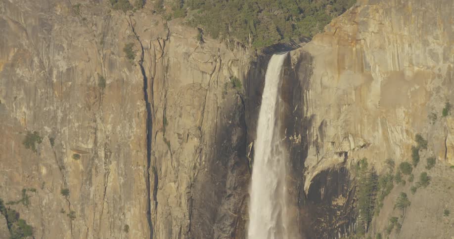 Waterfall splashes off of a cliff
