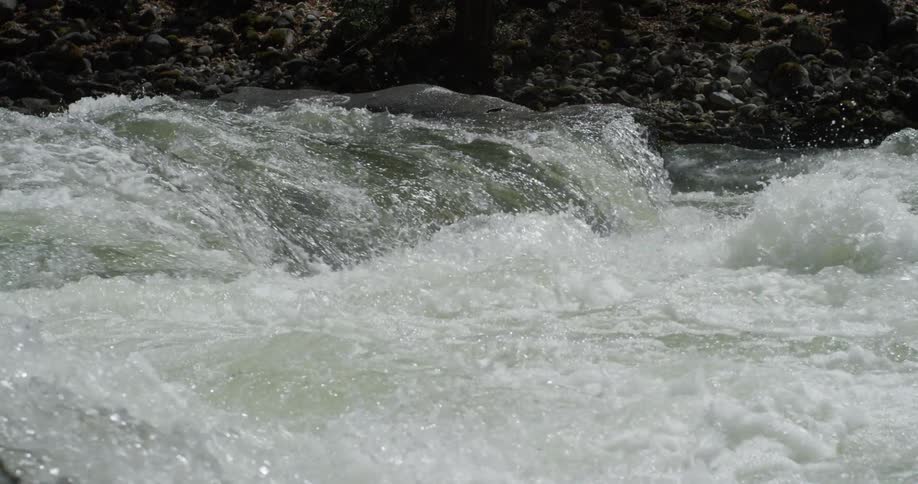 The sun is reflecting off the large stream