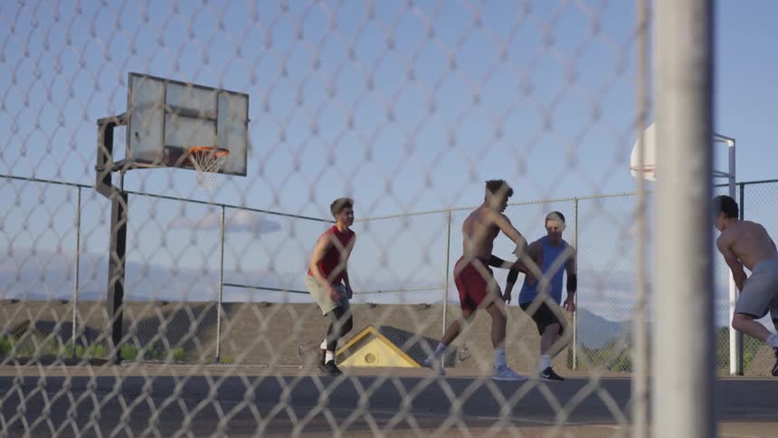 Boys Playing Pickup Basketball