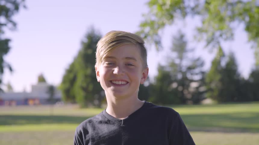 Boy Playing At A Park
