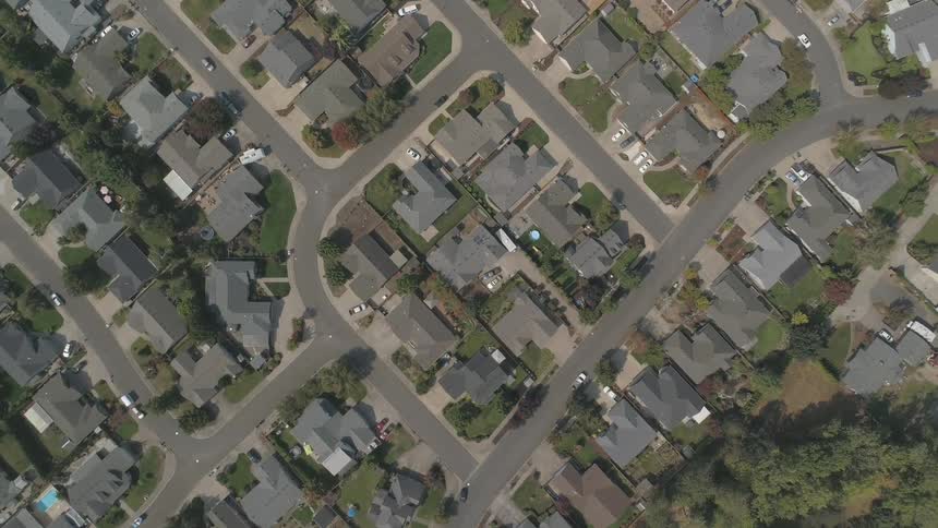 Roads around homes and yards create a geometric pattern