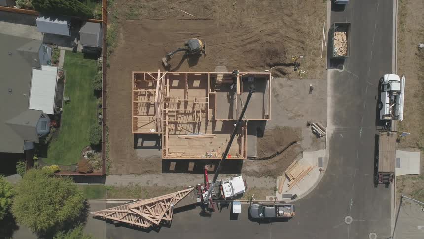 Construction site of house being built in neighborhood