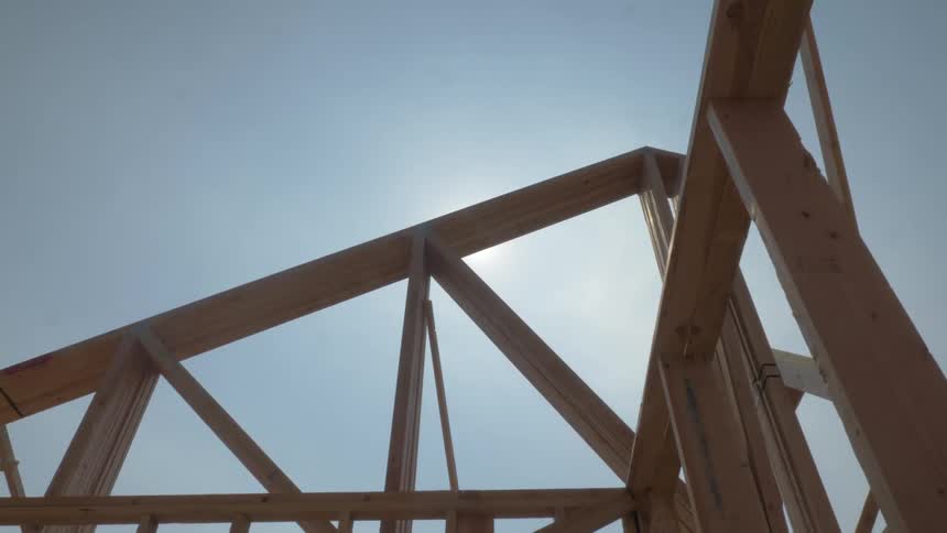 The sun is shining down on a construction project
