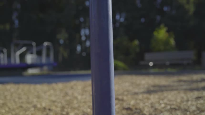 Boy Playing At A Park