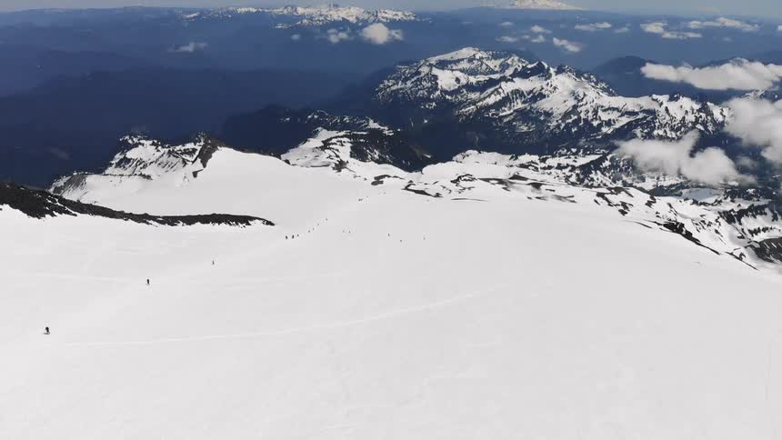 A vast mountain area covered in snow